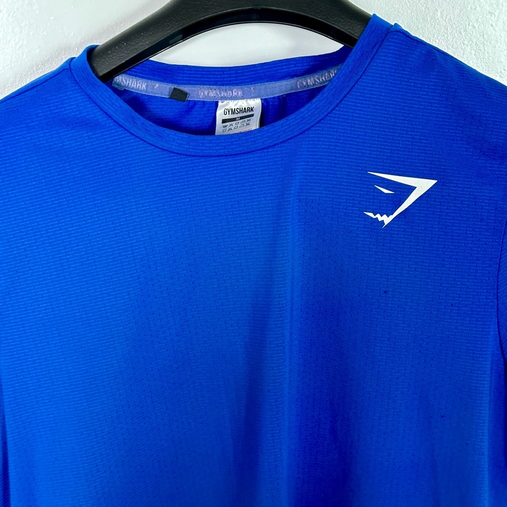 Selling men’s GymShark blue workout shirt size medium